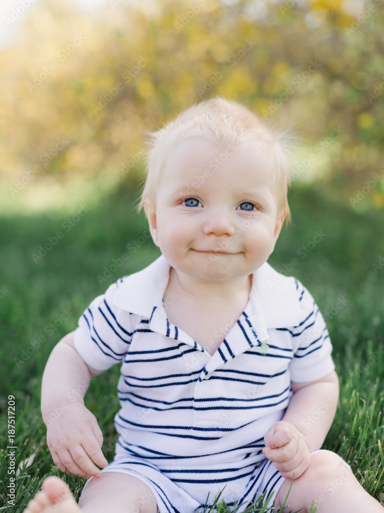 Baby sitting in the grass Baby sitting in the grass
