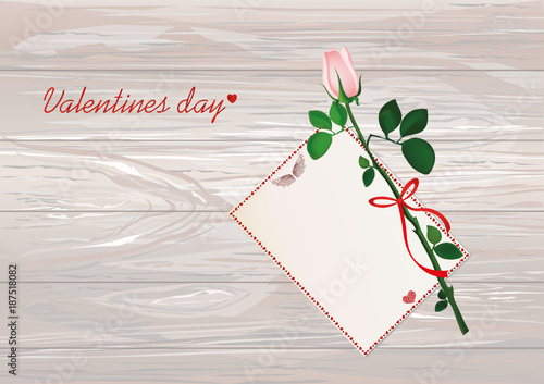 One pink flower with red bow and ribbon and with empty blank card