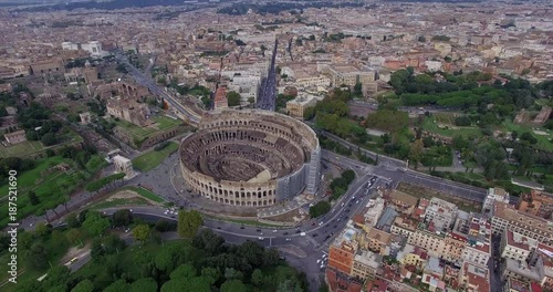 ROME, ITALY  – OCTOBER 2015 : Aerial shot over the Colosseum on a beautiful day with cityscape in view photo