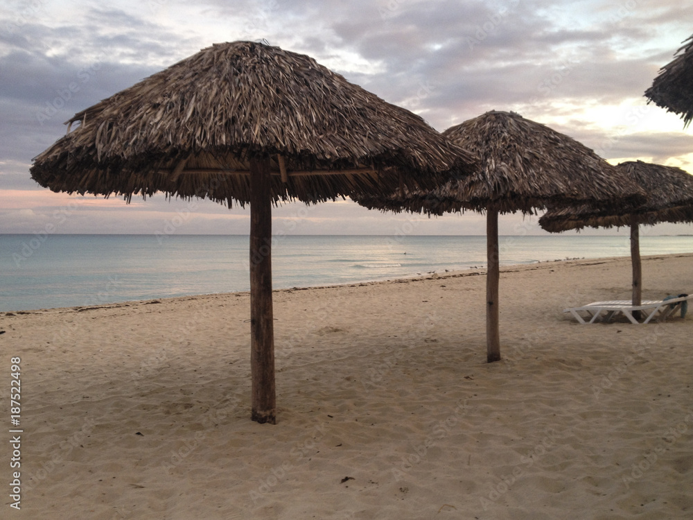 Straw umbrellas on a cuban beach