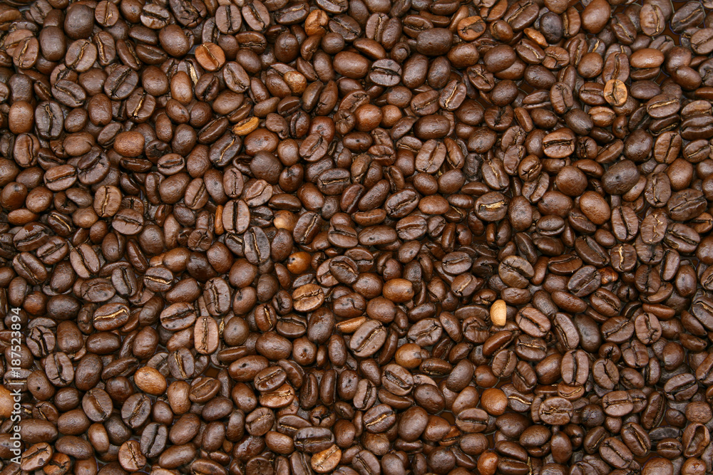 Close-up of brown roasted coffee beans background Close-up of brown roasted coffee beans background