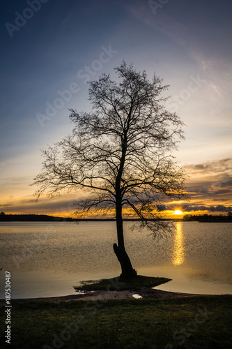 Fototapeta Naklejka Na Ścianę i Meble -  Sunrise over the Swiecajty lake near Wegorzewo, Masuria, Poland
