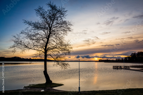 Fototapeta Naklejka Na Ścianę i Meble -  Sunrise over the Swiecajty lake near Wegorzewo, Masuria, Poland