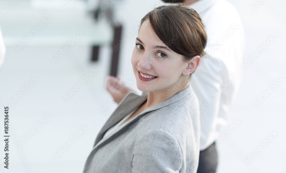 confident business woman on blurred background office. confident business woman on blurred background office.