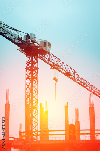 building crane against the background of construction
