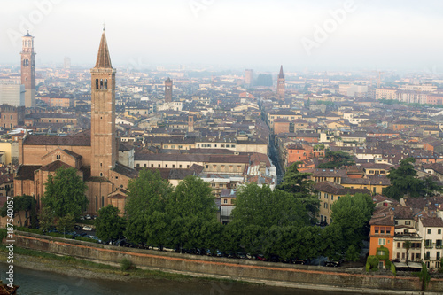 Verona's cityscape early in the morning. Roofs and buildings of the old Italian city. © vellot
