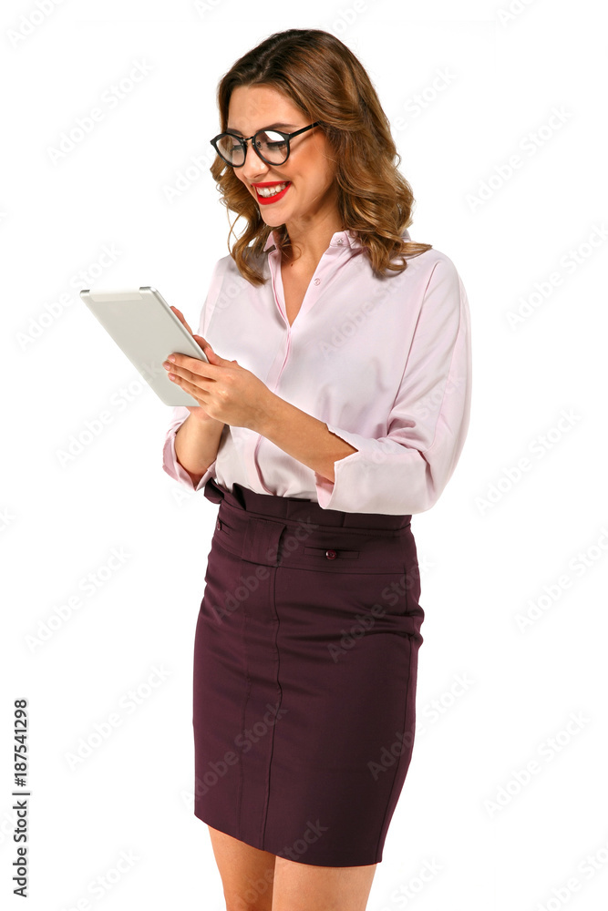 Attractive smiling business lady working with tablet, in office clothes, in eyeglasses, with red lips, on white background Attractive smiling business lady working with tablet, in office clothes, in eyeglasses, with red lips, on white background