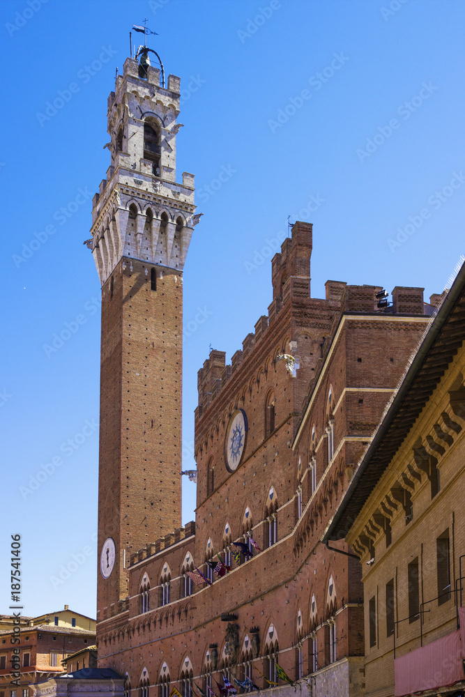 The Torre del Mangia, located in the Piazza del Campo in Siena, Italy