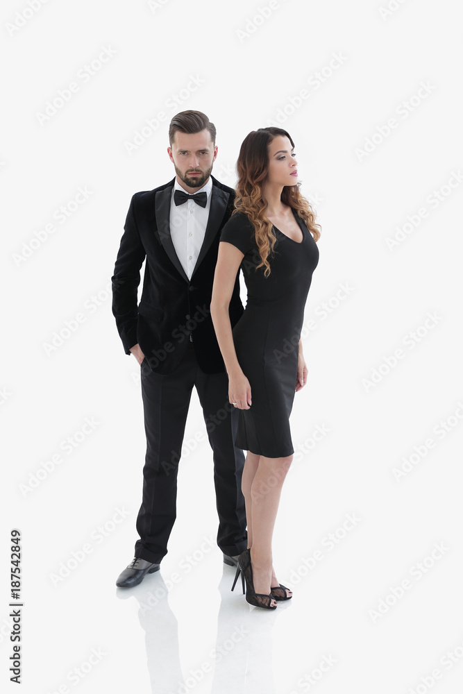 pair of men and women posing for the camera in a studio