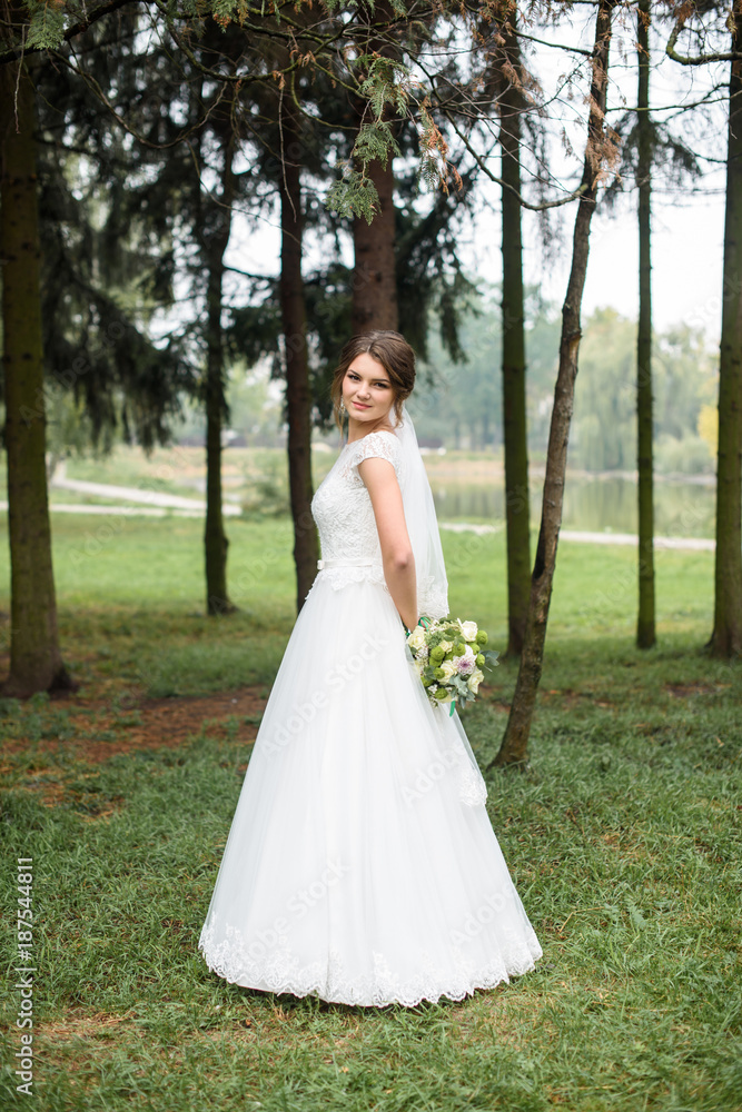 portrait of happy and beautiful young bride. One wedding day