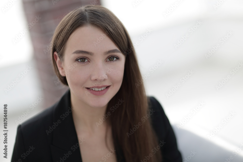 close up portrait of young business woman in modern office close up portrait of young business woman in modern office