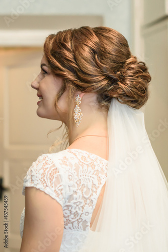 portrait of happy and beautiful young bride. One wedding day