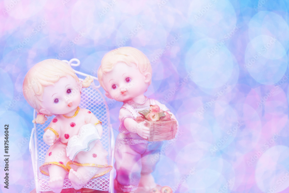 Couple of Dolls boy and Girls with bokeh background Couple of Dolls boy and Girls with bokeh background