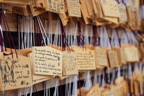 Fotografie Detail of wishes written on the wooden boards called emas placed by visitors at the Meiji Shrine, a temple dedicated to the Emperor Meiji and his wife