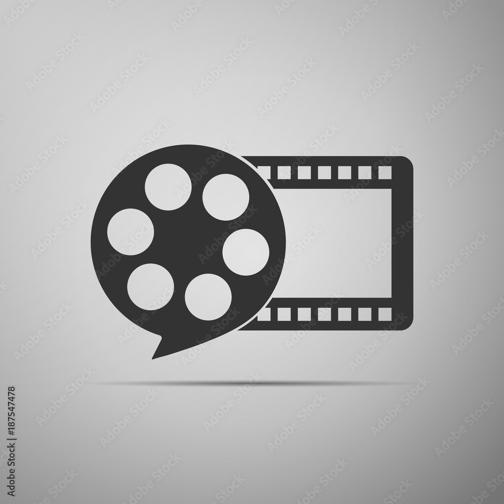 Fototapeta premium Film reel and play video movie film icon isolated on grey background. Flat design. Vector Illustration