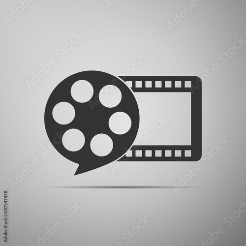 Film reel and play video movie film icon isolated on grey background. Flat design. Vector Illustration