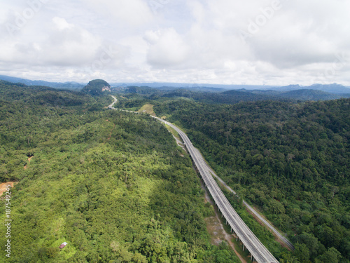 aerial view of Central Spine Road   CSR highway   located in kuala lipis  pahang  malaysia. is a new highway under construction in the center of Peninsula Malaysia  Malaysia. It is a toll-free highway