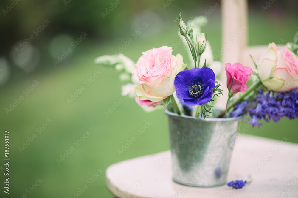 Flowers on a rustic chair Flowers on a rustic chair