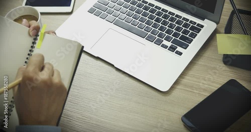 Young Business Man Working Hard, at the Office Table, Time Lapse Footage Concept of hard work