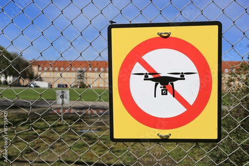 prohibition sign to fly with drones on the fence. No drone zone.