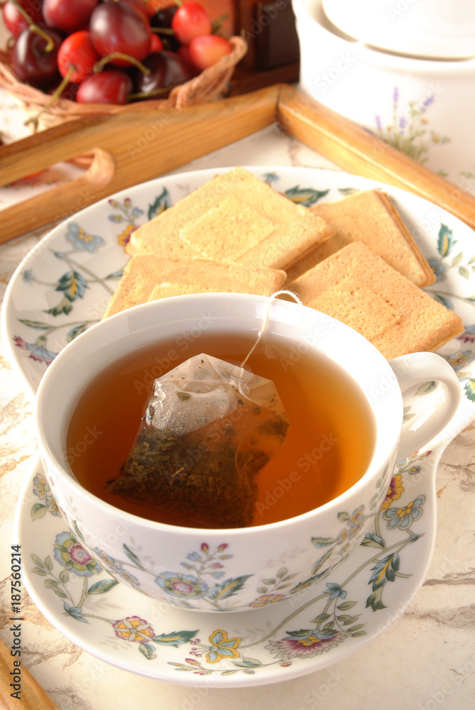 Tea bag in the cup with hot water Tea bag in the cup with hot water