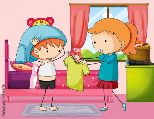 Boy getting dress in bedroom