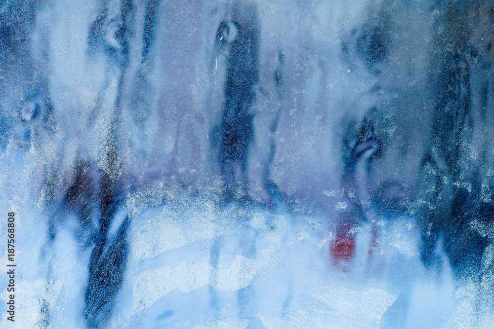 Frosty pattern on the window. Beautiful natural background. Winter theme. Close-up 