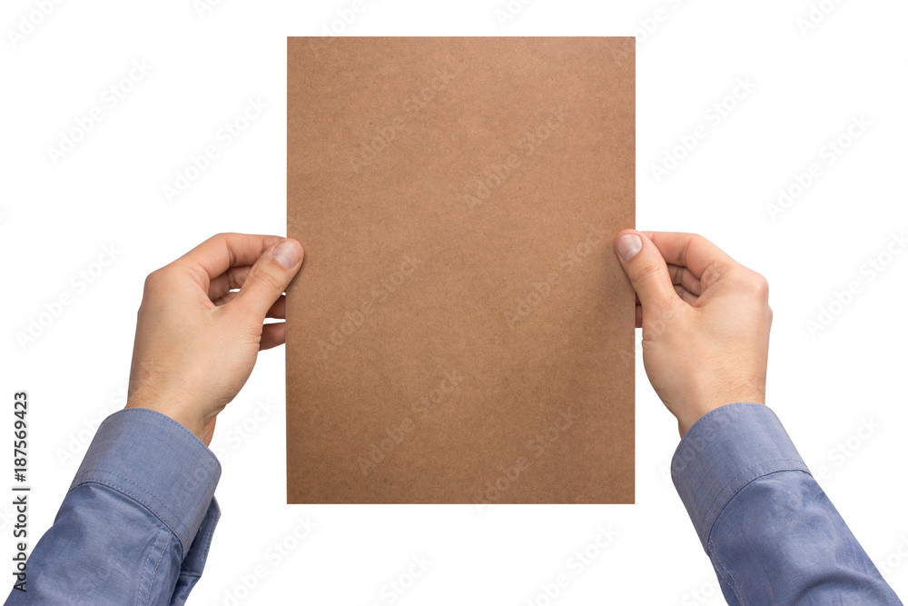 Mockup A4 letter vertically empty blank kraft holds the man in his hand in shirt. Isolated on a white background Mockup A4 letter vertically empty blank kraft holds the man in his hand in shirt. Isolated on a white background