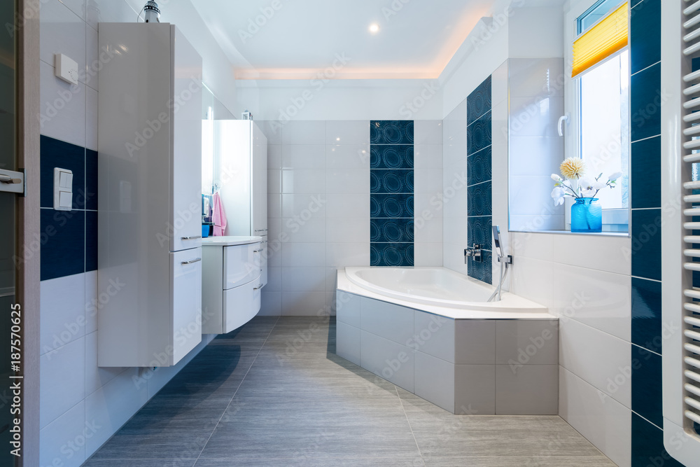 Modern Bathroom - Glossy white and blue tiles - bathtub, sink and floor heating Modern Bathroom - Glossy white and blue tiles - bathtub, sink and floor heating