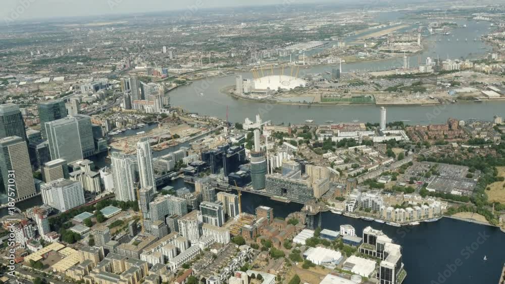 London,England,UK – July 2015 : Aerial shot of outskirts of London on a sunny day with O2 arena in view London,England,UK – July 2015 : Aerial shot of outskirts of London on a sunny day with O2 arena in view