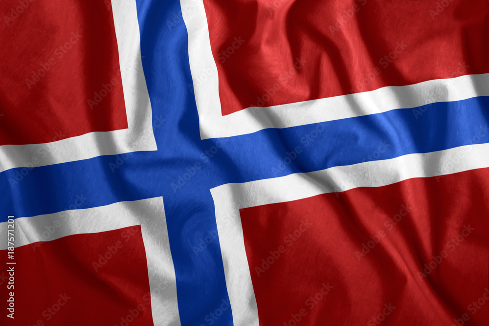 Fototapeta premium The Norwegian flag is flying in the wind. Colorful national flag of Norway. Patriotism, patriotic symbol.