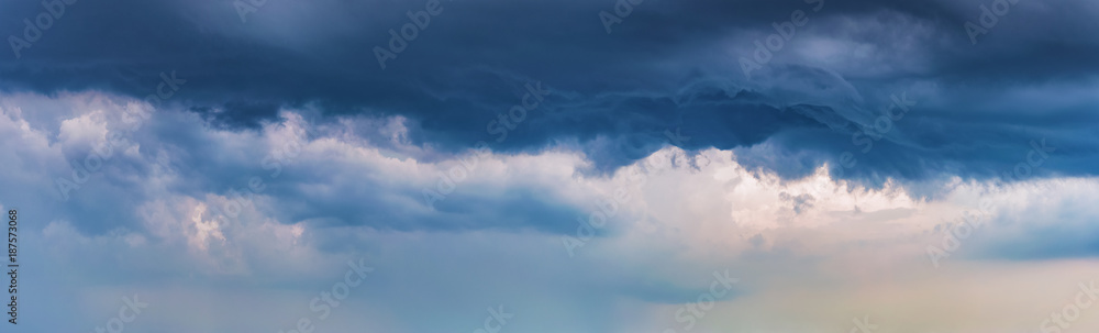 dark dramatic clouds. background panorama of a stormy sky dark dramatic clouds. background panorama of a stormy sky