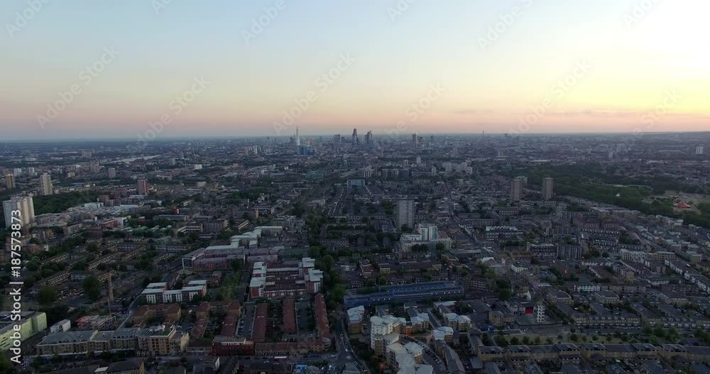 London,England,UK – July 2015 : Aerial view over London during sunset with view of the skyline London,England,UK – July 2015 : Aerial view over London during sunset with view of the skyline