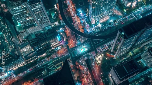 Time lapse,Hyperlapse ,Of traffic on city streets at night. Aerial view and top view of traffic on freeway, 4K. photo