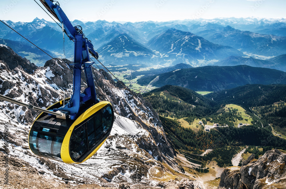 Cable car or gondola to mountain peak of Dachstein glacier in Austrian Alps  Photos | Adobe Stock