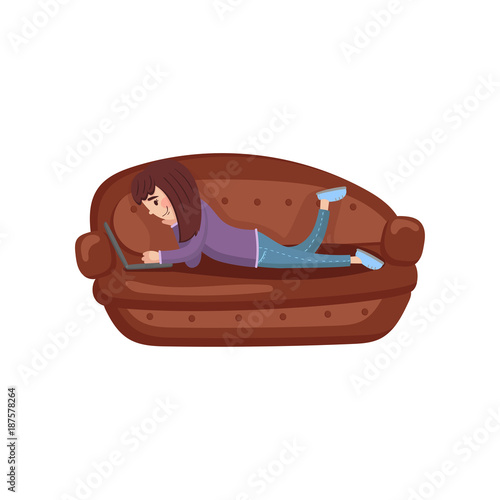 Girl lying on her stomach on a sofa using a laptop computer cartoon vector Illustration