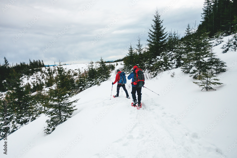 Two climbers in the winter.