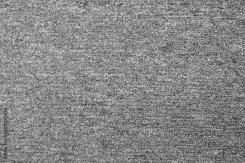 Φωτογραφία close up of monochrome grey carpet texture background from above
