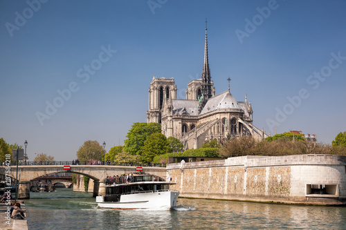 Paris, Notre Dame cathedral with boat on Seine, France © Tomas Marek