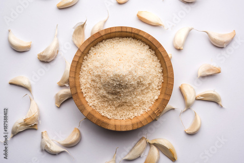 Garlic powder is ground, dehydrated garlic. It's a common seasoning  for pasta, pizza and grilled chicken.
