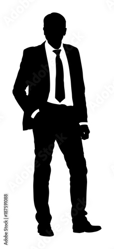 Confident leader standing. Businessman go to work vector silhouette illustration. Handsome man in suite with hands in pockets. Standing casual pose. Relaxed man.