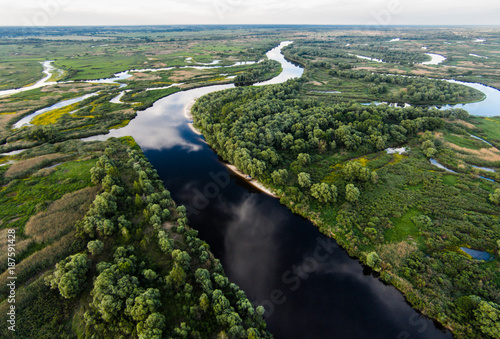 beautiful landscape with river and green vegetation on shores, polesie, pripyat, Ukraine
