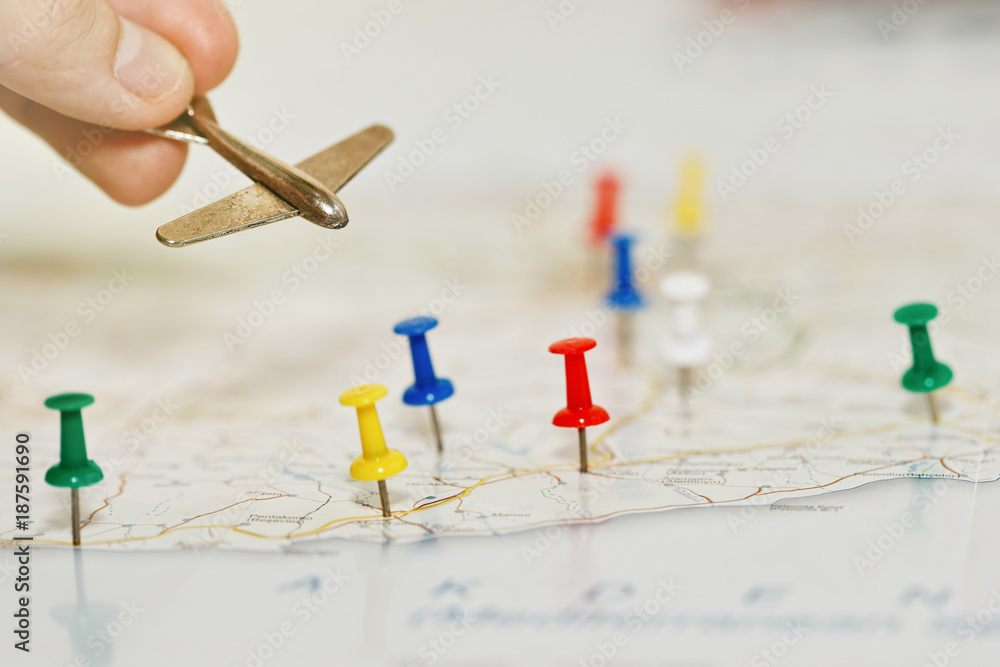 Travel by aircraft concept with map and pins Travel by aircraft concept with map and pins