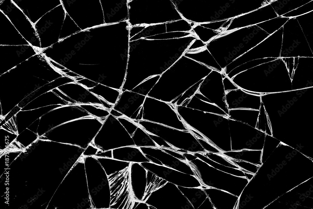 Top view cracked glass screen black and white. Top view cracked glass screen black and white.