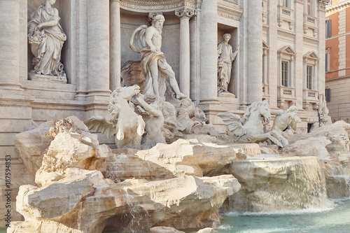 One of the most significant sights of Rome - the Trevi Fountain in a bright summer day without people
