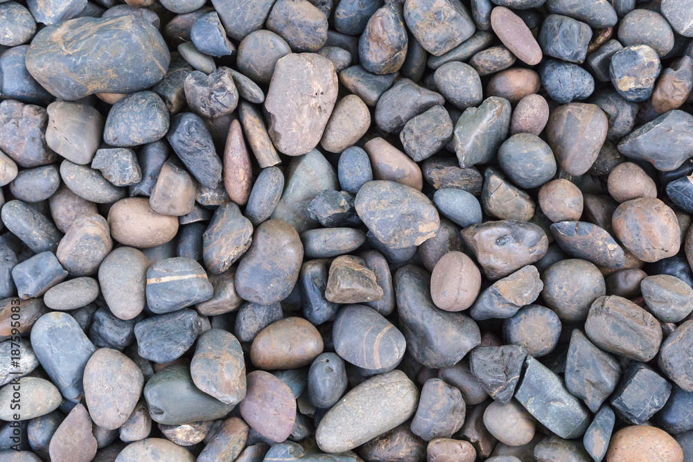 Stone pebbles texture or stone pebbles background for interior design business. exterior decoration and industrial construction idea concept design. Stone pebbles motifs that occurs natural. Stone pebbles texture or stone pebbles background for interior design business. exterior decoration and industrial construction idea concept design. Stone pebbles motifs that occurs natural.