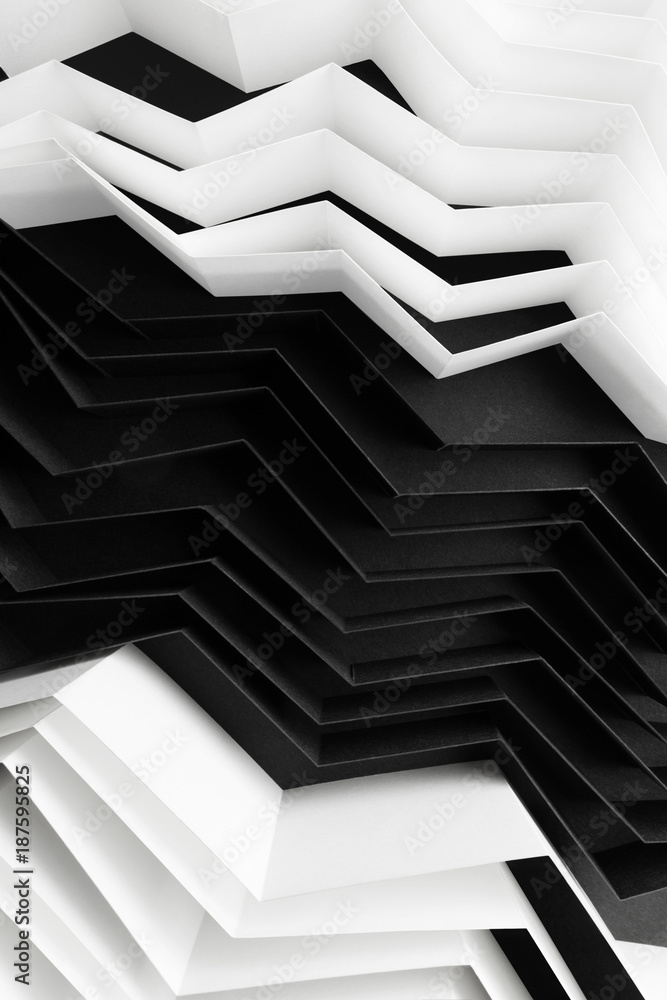 Obraz premium Black and white abstract background with stripes of paper