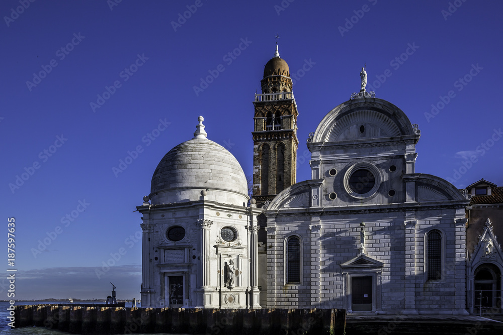 View from the Venice lagoon of the church of San Michele in Isola on the cemetery island of San Michele, Venice, Italy