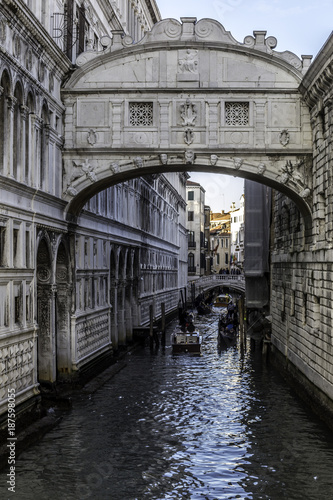 Bridge of Sighs at Doge's Palace with gondolas, Venice, Italy
