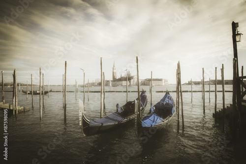 Gondolas on the waterfront of St Mark's Basin with San Giorgio Maggiore and Giudecca island in the background © Pavel Rezac